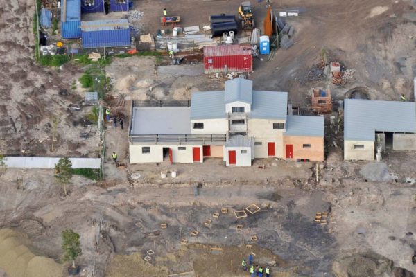 aerial view houses containers construction