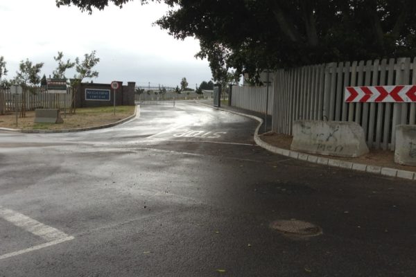 stop street warning sighn cement blocks entrance