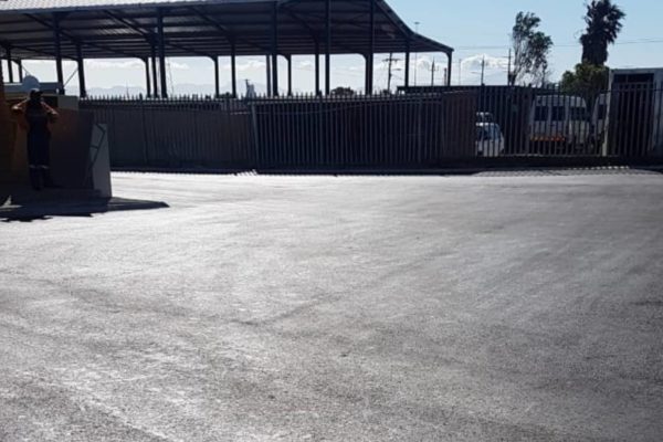 stretched paving road mini bus fence